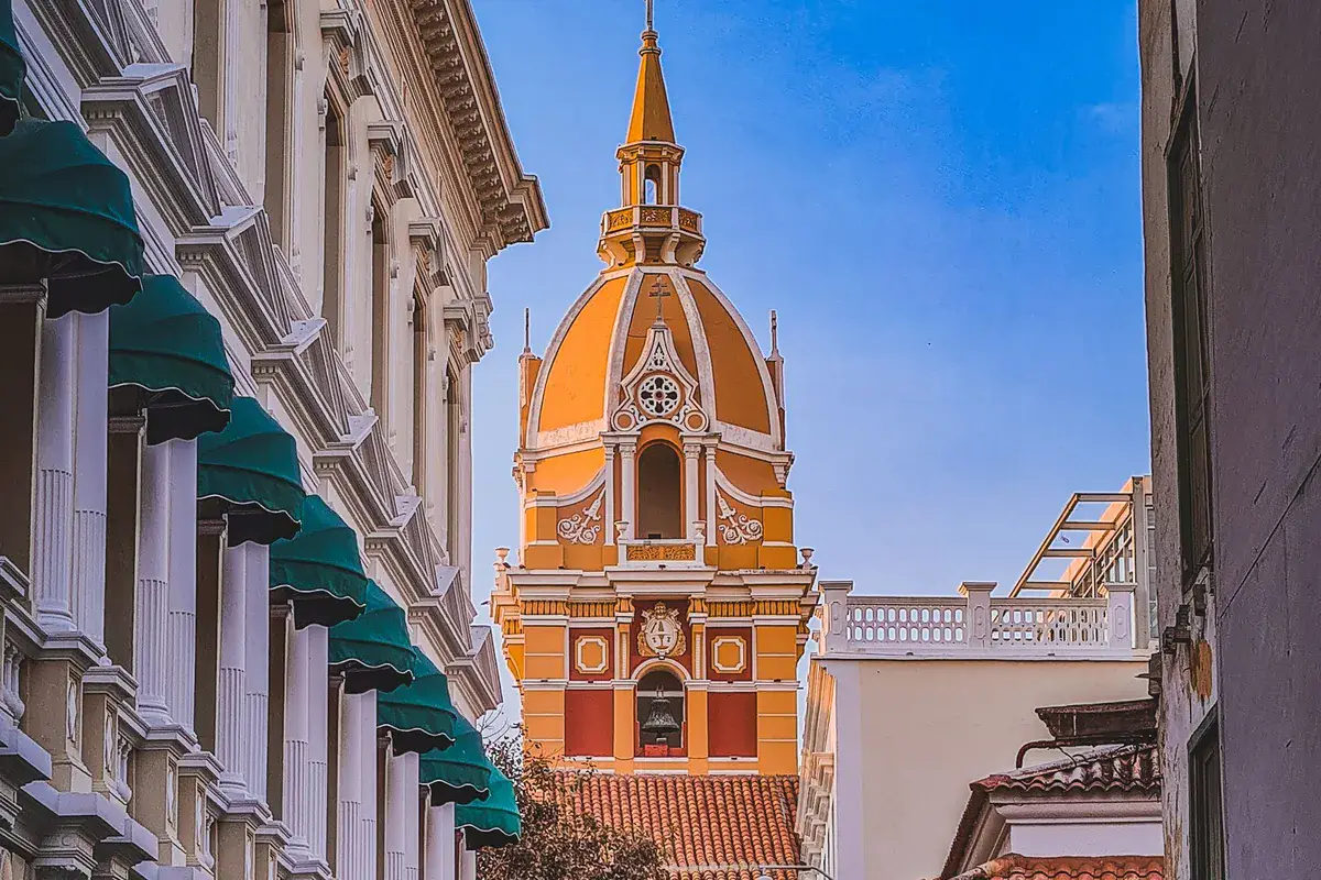 Historic street and cathedral tower in Cartagena, Colombia